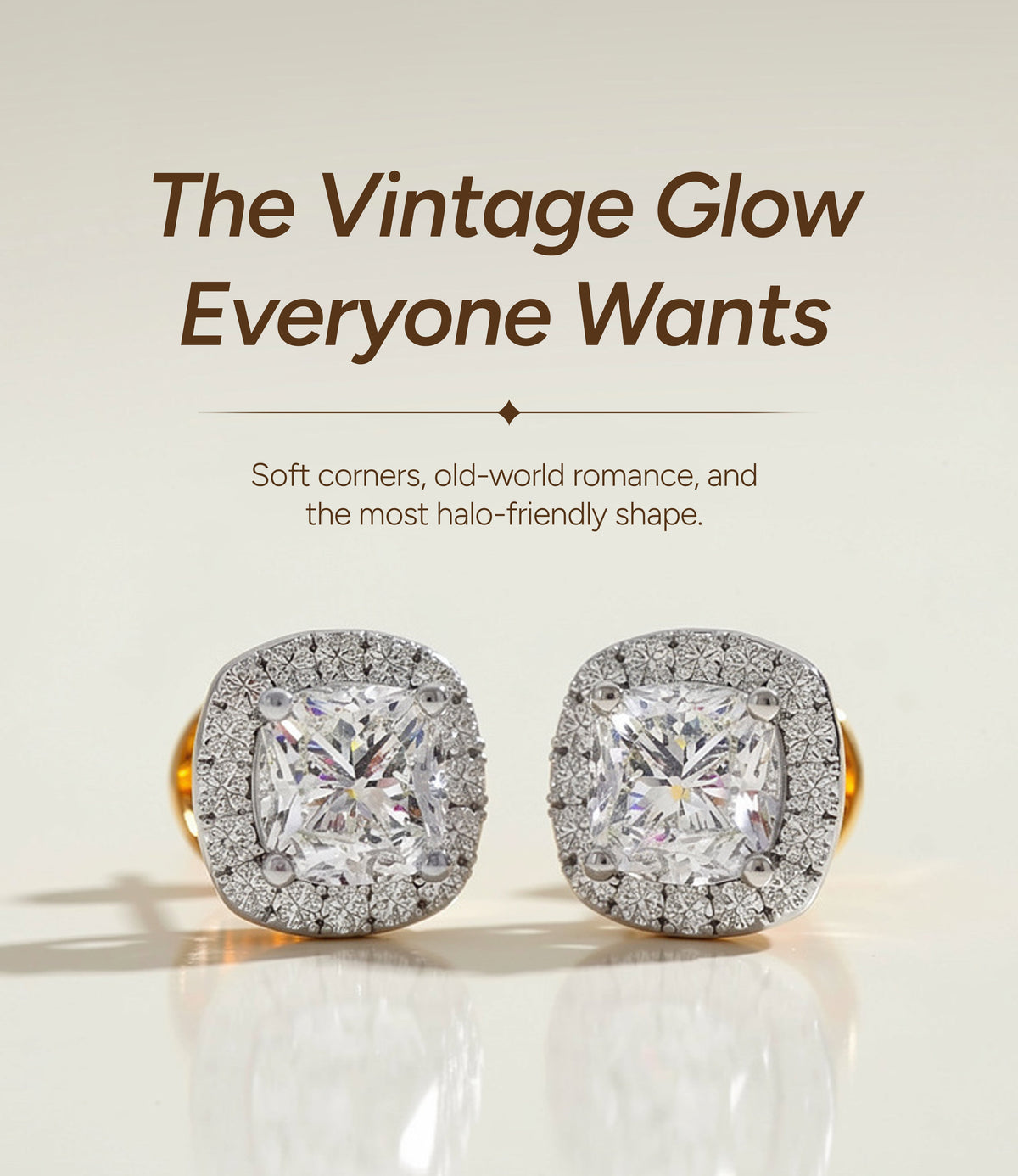 A pair of cushion-cut diamond halo stud earrings with yellow gold backings,