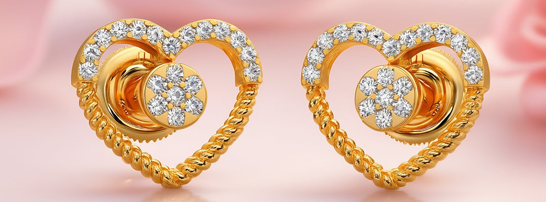 Gold heart-shaped earrings with diamond accents on a pink background