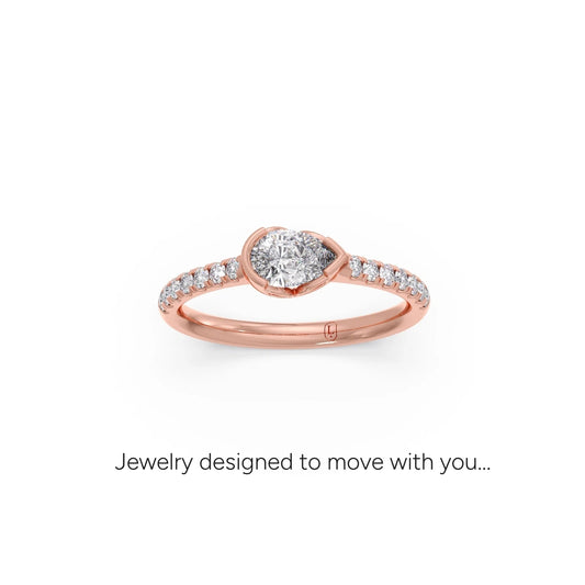 Pear Cut Center with Round Diamond Accents Ring - Rose