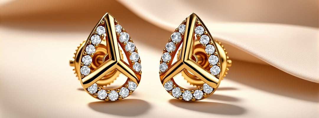 Gold teardrop earrings with diamond accents on a beige background
