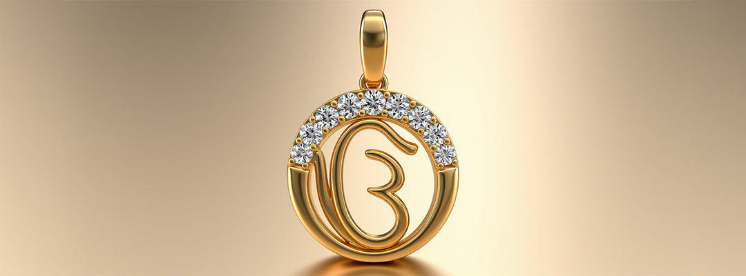 Gold pendant with letter 'Om' design on a beige background